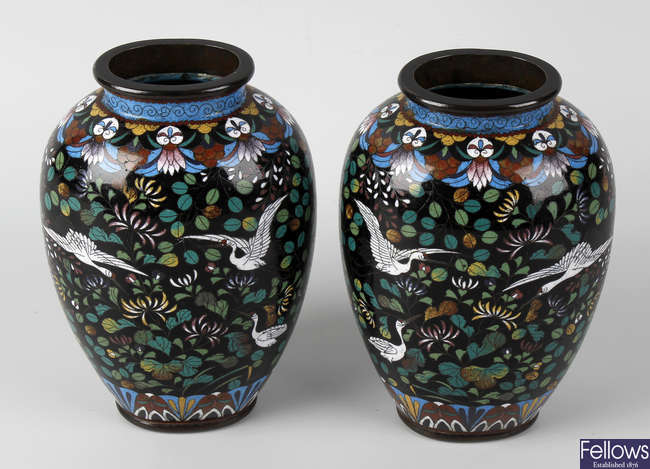 A pair of cloisonne vases.