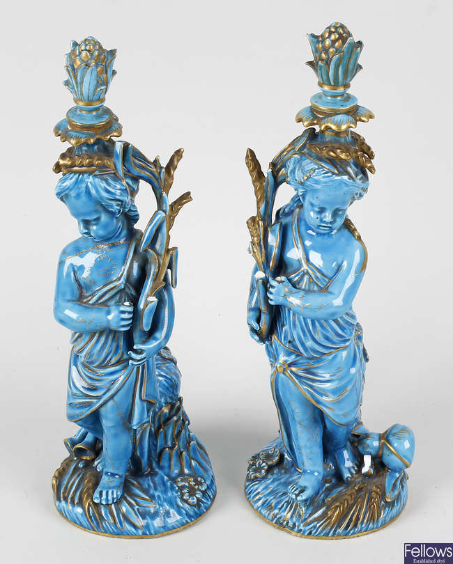 A pair of Serves porcelain figures.