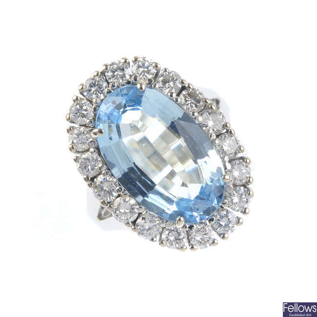 An aquamarine and diamond cluster ring. 