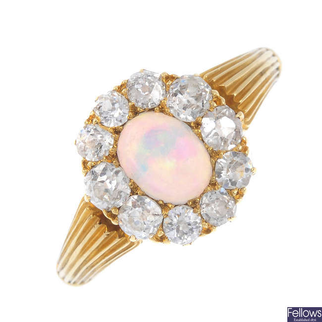 An early 20th century opal and diamond cluster ring