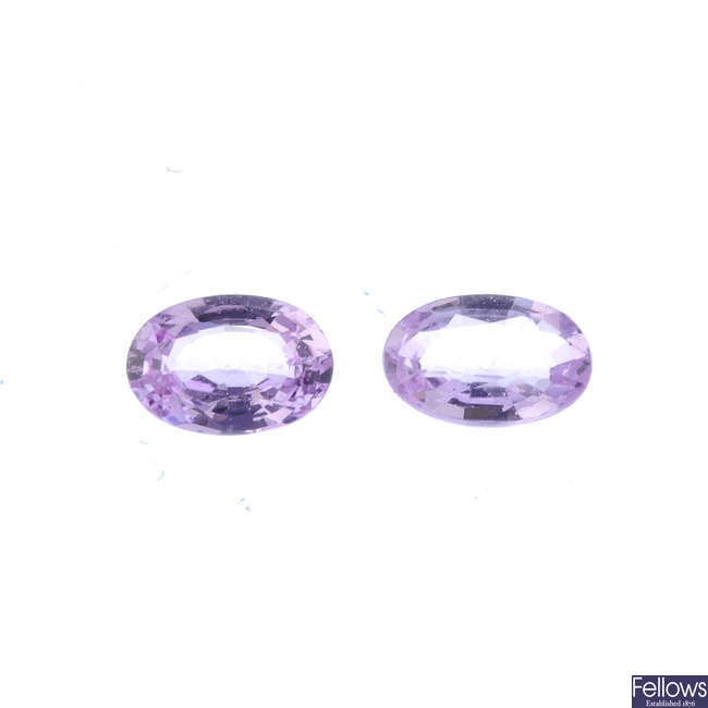 Two oval-shape pink sapphires, weighing 0.52 and 0.51ct.