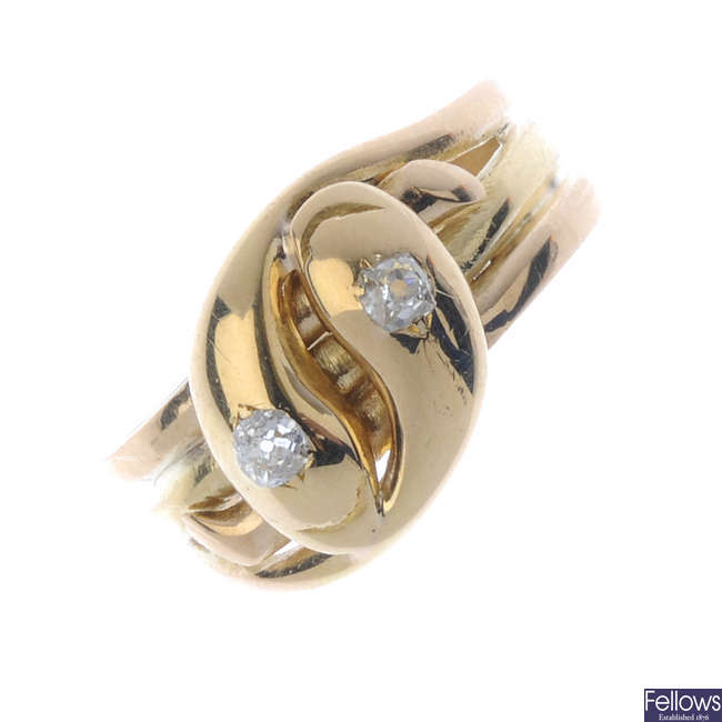 A 1930s 18ct gold diamond snake ring.