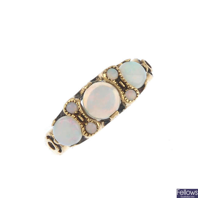 An opal three-stone ring.