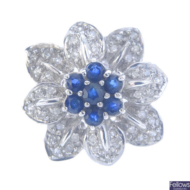 A 14ct gold sapphire and diamond floral cluster ring.