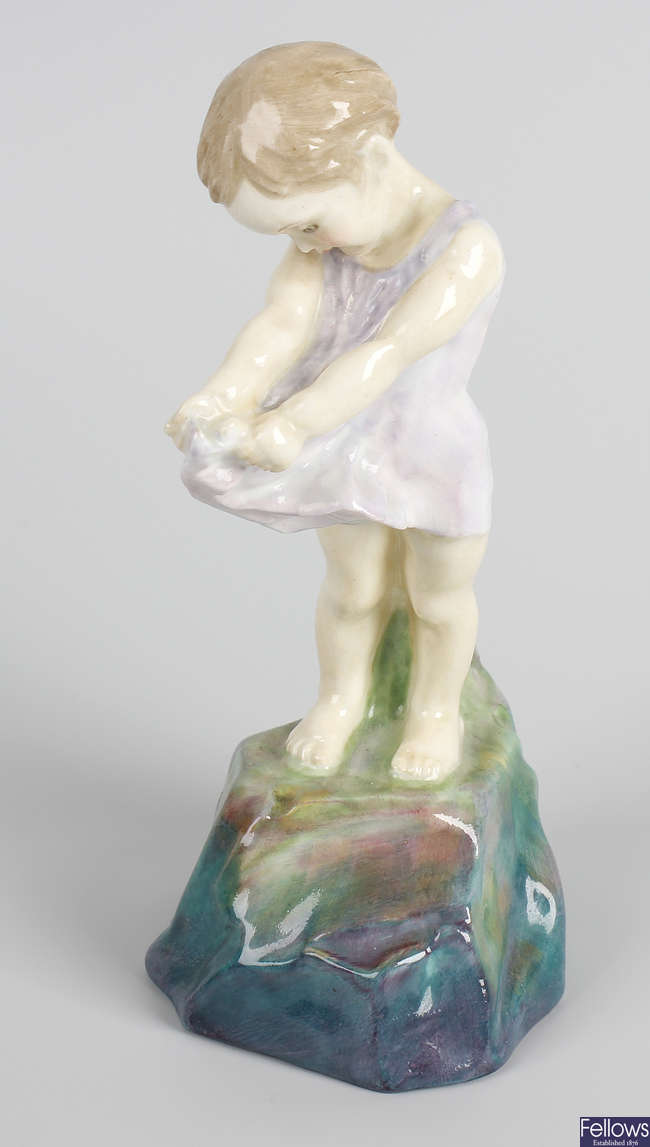 A Royal Doulton figurine.