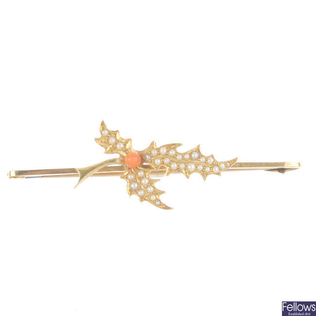 An early 20th century 15ct gold coral and split pearl brooch.