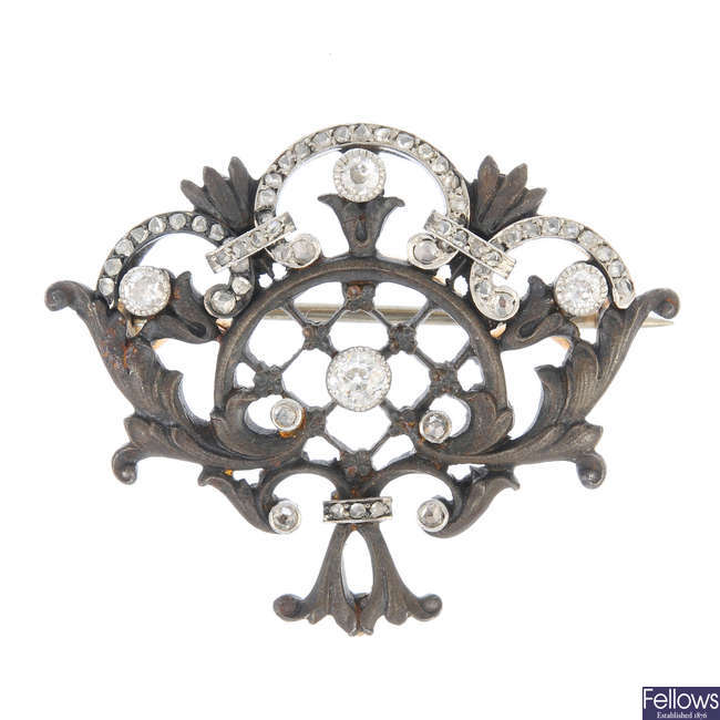A mid 19th century iron and gold diamond brooch.