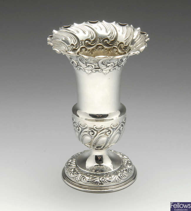 An Edwardian silver vase.