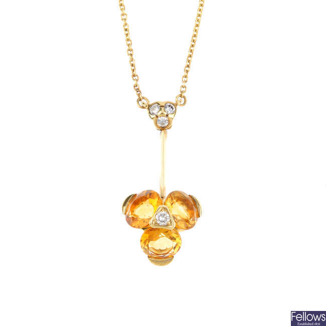 An 18ct gold citrine and diamond necklace.