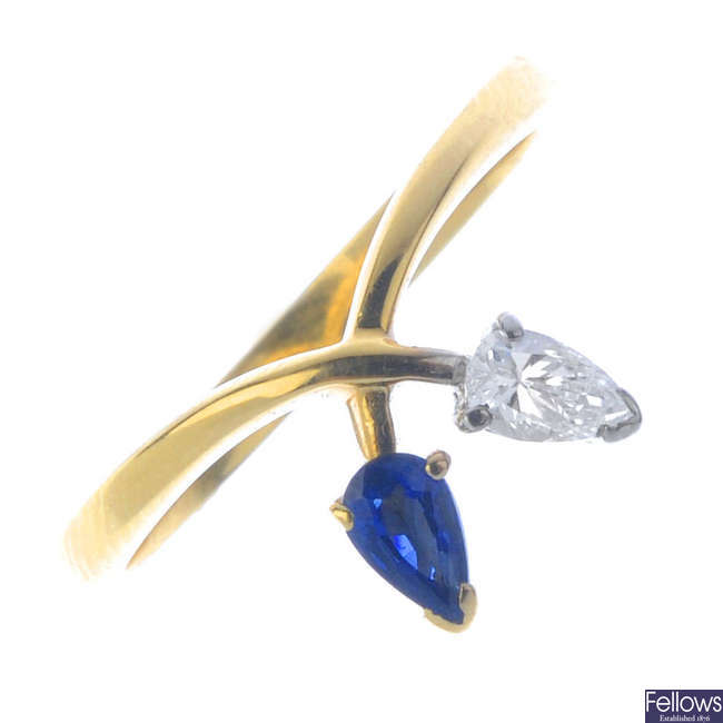 An 18ct gold diamond and sapphire two-stone dress ring.