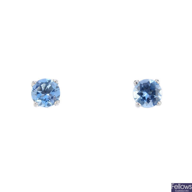 A pair of 18ct gold circular-shape aquamarine stud earrings.