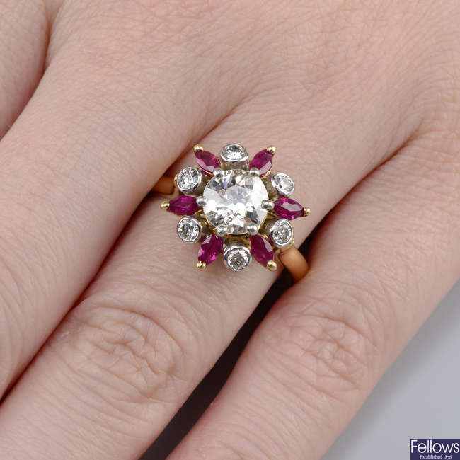 An 18ct gold old-cut diamond, ruby and brilliant-cut diamond floral cluster ring.