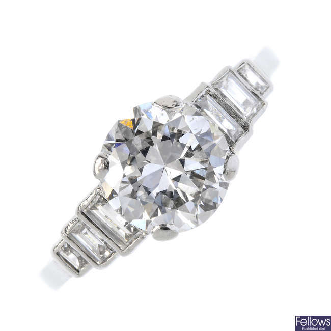 An Art Deco platinum diamond single-stone ring.