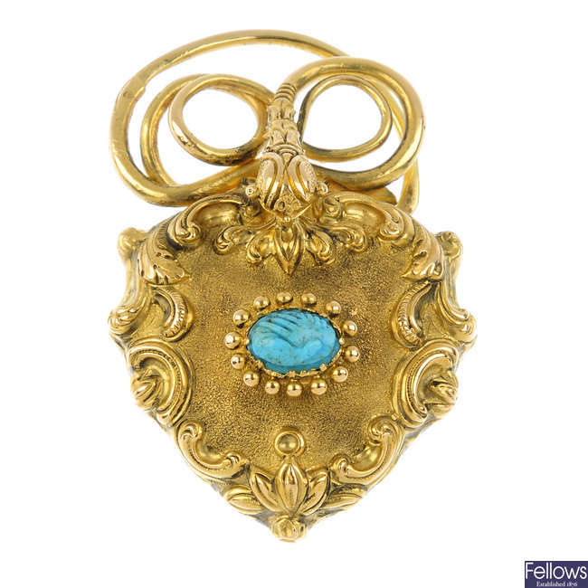 A late 19th century gold and turquoise memorial clasp.
