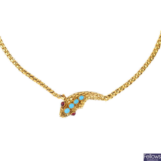 A mid Victorian gold gem-set snake necklace.