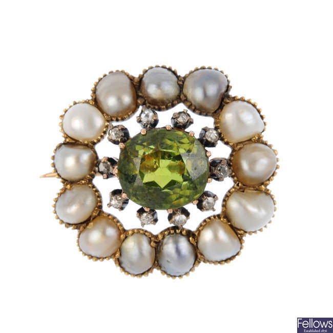 A demantoid garnet, split pearl and diamond brooch.