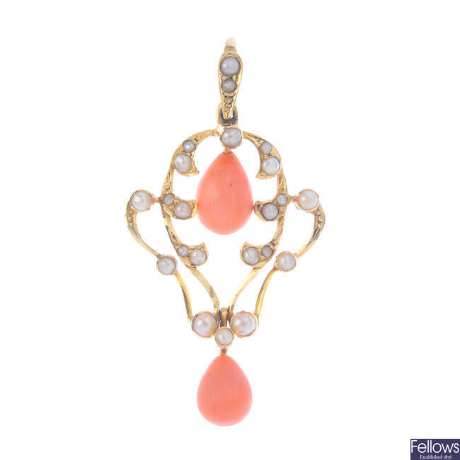 An early 20th century gold coral and split pearl pendant.