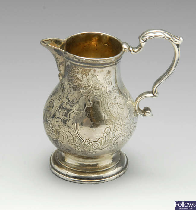 A George II silver cream jug, London 1743.