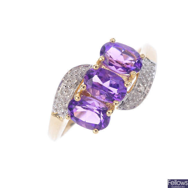 A 9ct gold amethyst and diamond ring.