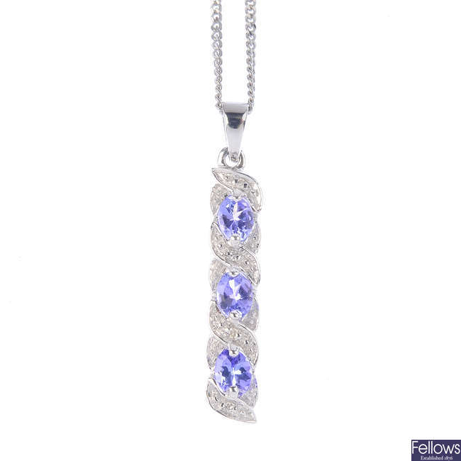 A 9ct gold diamond and tanzanite pendant, with 9ct gold chain.