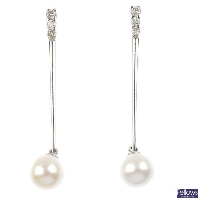 A pair of 9ct gold pearl and diamond earrings.