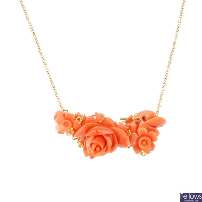 A coral pendant, with chain.