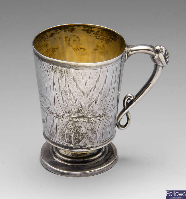 A mid-Victorian silver christening mug.