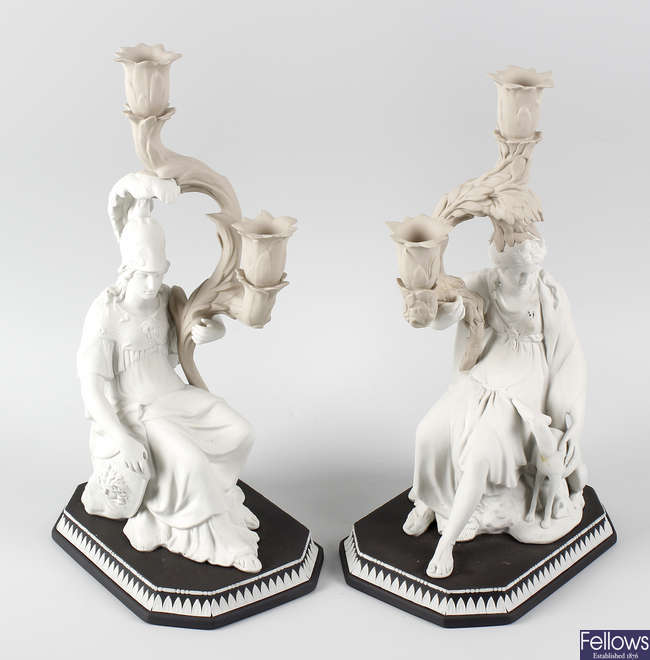 A superb pair of Wedgwood three-colour jasperware figural candelabra.