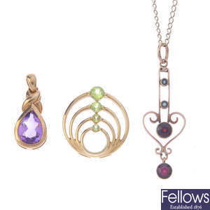 Three 9ct gold gem-set pendants and a chain.