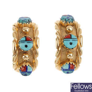 A pair of multi-gem earrings.