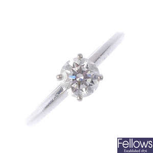 DE BEERS - a platinum diamond single-stone ring.
