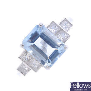 A aquamarine and diamond dress ring.