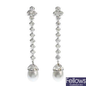 A pair of diamond and imitation pearl earrings.