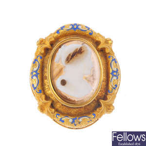 A late Victorian gold enamel cameo brooch.