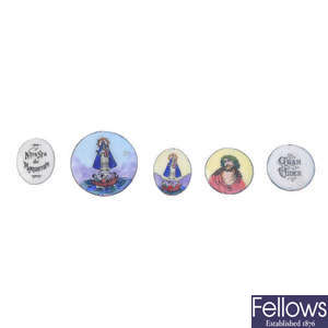 A selection of religious enamel plaques.