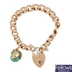 An early 20th century 9ct gold bracelet and stone-set charm.