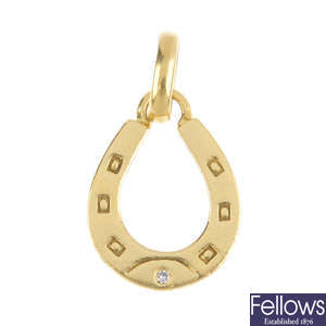 LINKS OF LONDON - an 18ct gold diamond horseshoe pendant.