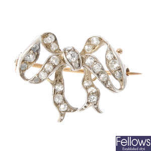 A late 19th century silver and gold diamond bow brooch.