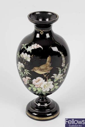A late 19th century enamelled glass vase