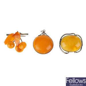 Three items of natural amber jewellery.