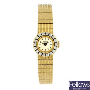 PATEK PHILIPPE - a lady's 18ct yellow gold bracelet watch.
