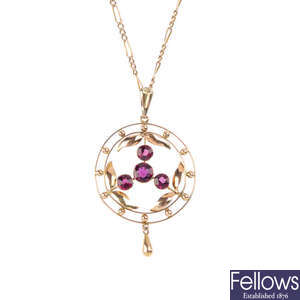 An early 20th century 9ct gold garnet pendant, with chain.