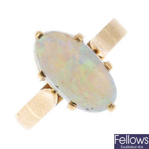 An opal single-stone ring.
