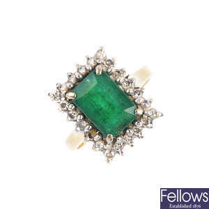A 1970s 18ct gold emerald and diamond cluster ring.