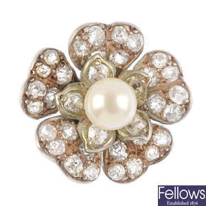 A single diamond and cultured pearl stud earring.