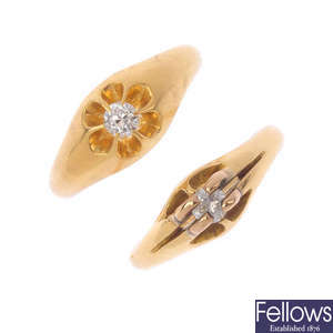 Two early 20th century gold diamond single-stone rings.