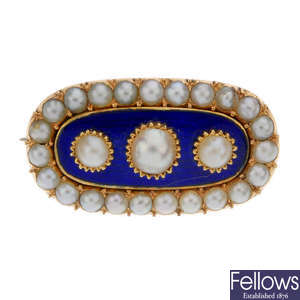 A late Victorian split pearl and blue enamel brooch.