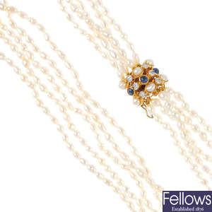 A diamond, sapphire, and cultured pearl jewellery set.