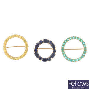 Four 9ct gold gem-set brooches.