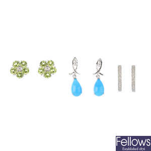 Three pairs of 9ct gold  diamond and gem-set earrings.